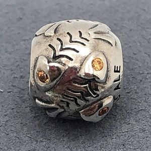 Pandora Fish Bone with Orange CZ Charm.